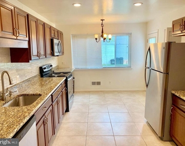 6414 Wilson Lane - Photo Thumbnail 5