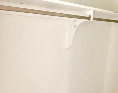 6414 Wilson Lane - Photo Thumbnail 17