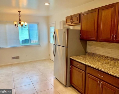 6414 Wilson Lane - Photo Thumbnail 6