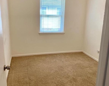6414 Wilson Lane - Photo Thumbnail 13