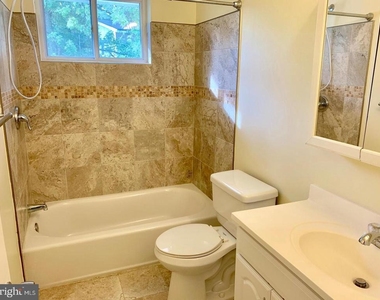 6414 Wilson Lane - Photo Thumbnail 10