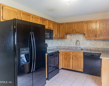 3844 English Colony Drive N - Photo Thumbnail 2