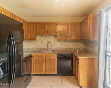 3844 English Colony Drive N - Photo Thumbnail 1