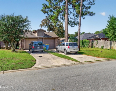 8010 International Village Drive - Photo Thumbnail 1