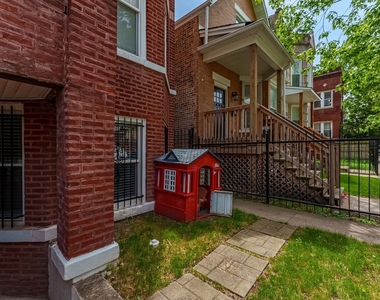 555 N Lawler Avenue - Photo Thumbnail 2