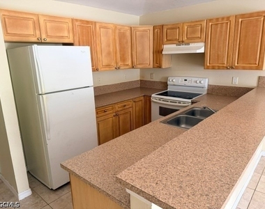 4639 28 Street Sw - Photo Thumbnail 2