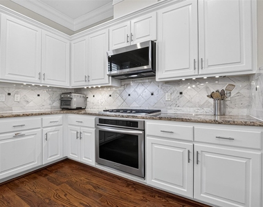1042 W 15th 1/2 Street - Photo Thumbnail 19