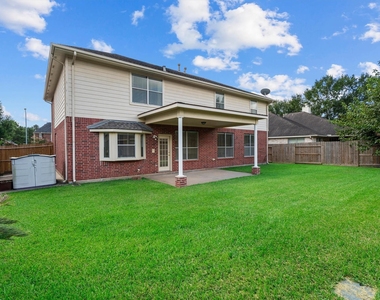 9218 Memorial Pines Way - Photo Thumbnail 32