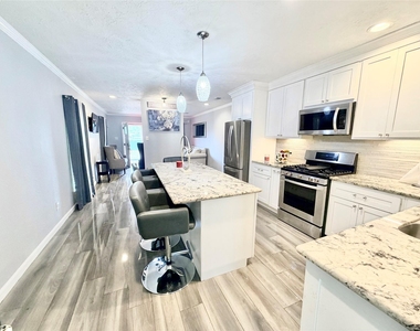8821 Woodruff Street - Photo Thumbnail 3