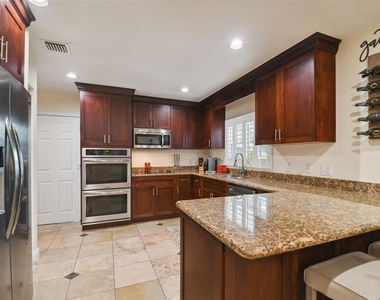 4802 W Longfellow Avenue - Photo Thumbnail 11