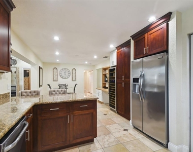 4802 W Longfellow Avenue - Photo Thumbnail 14
