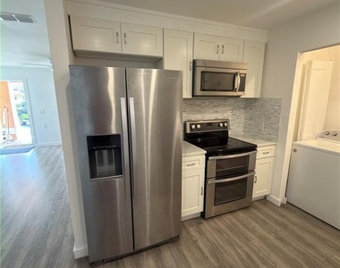 1302 Ariana Woods Circle - Photo Thumbnail 3