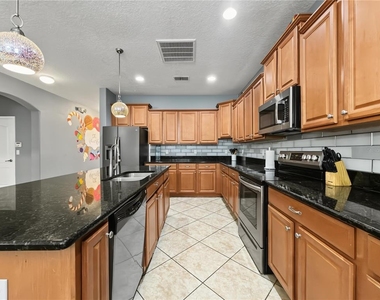 8854 Candy Palm Road - Photo Thumbnail 7