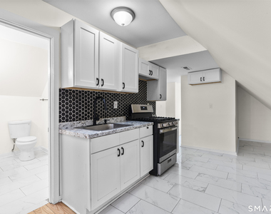 693 Dixwell Avenue - Photo Thumbnail 3