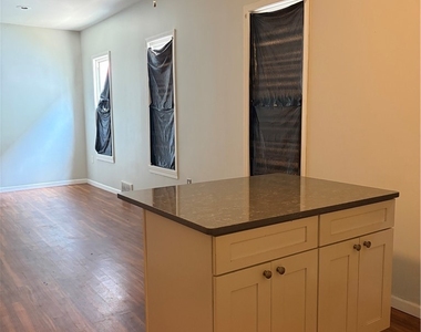 569 E Utica Street - Photo Thumbnail 1