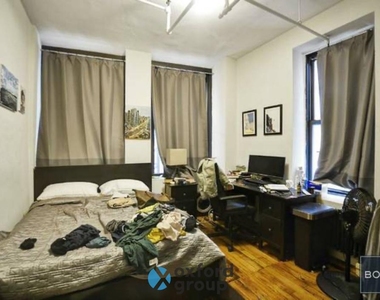 E 26th St. - Photo Thumbnail 5