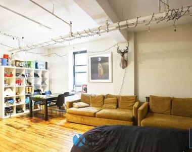 E 26th St. - Photo Thumbnail 2