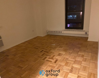 E 26th St. - Photo Thumbnail 4