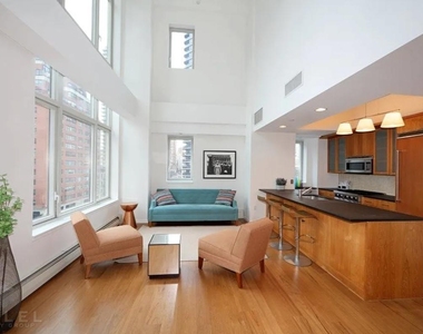 E 59th St. - Photo Thumbnail 4