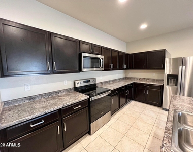 1259 E Eric Place - Photo Thumbnail 4