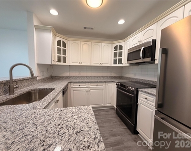 9039 J M Keynes Drive - Photo Thumbnail 4