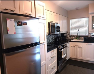 141 Ne 10th Avenue - Photo Thumbnail 3