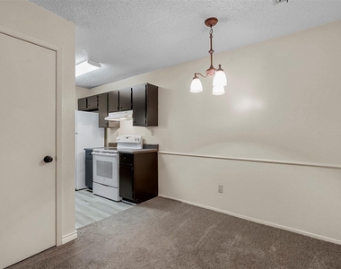 5981 Arapaho Road - Photo Thumbnail 5