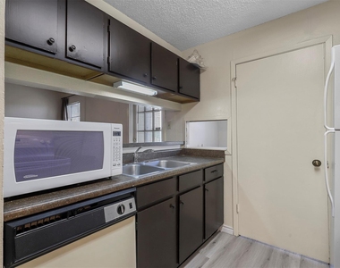 5981 Arapaho Road - Photo Thumbnail 8
