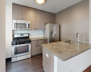 401 E 34th St - Photo Thumbnail 1