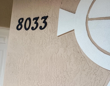 8033 Carnoustie Place - Photo Thumbnail 2
