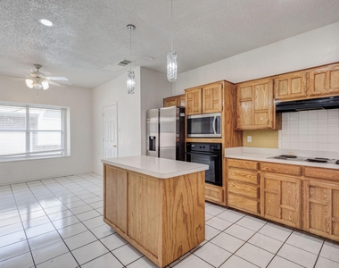 9118 Barton Creek Drive - Photo Thumbnail 5
