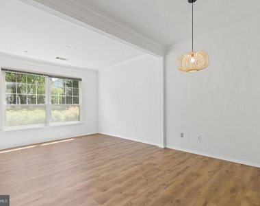 1530 Spring Gate Drive - Photo Thumbnail 3