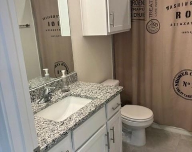 3403 N Monument Dr N - Photo Thumbnail 7