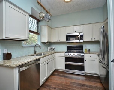 7508 Windrush Dr - Photo Thumbnail 7