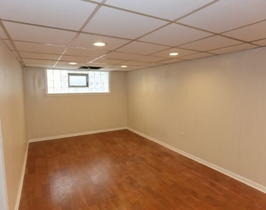 1473 W Erie Street - Photo Thumbnail 4