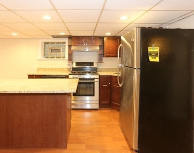 1473 W Erie Street - Photo Thumbnail 3
