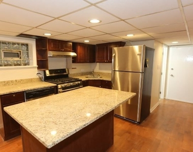 1473 W Erie Street - Photo Thumbnail 2