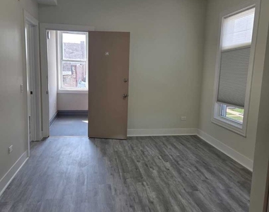 6207 S Bishop Street - Photo Thumbnail 1