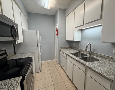 10049 Westpark Drive - Photo Thumbnail 1
