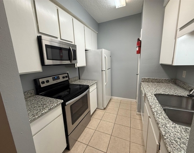 10049 Westpark Drive - Photo Thumbnail 2