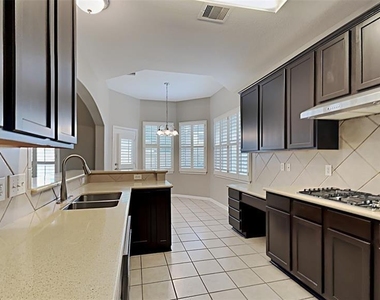 11106 Bandit Trail Dr - Photo Thumbnail 3