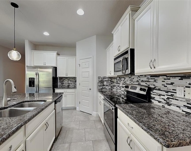 15543 Waterleigh Cove Drive - Photo Thumbnail 3