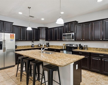 8898 Candy Palm Road - Photo Thumbnail 3