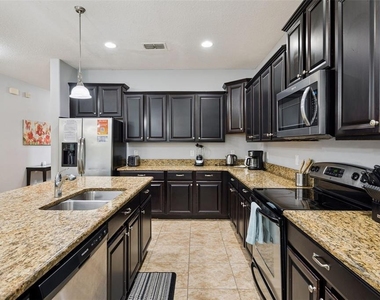 8898 Candy Palm Road - Photo Thumbnail 4