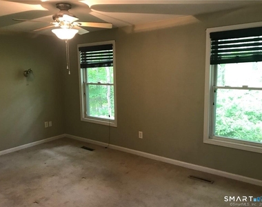 864 Litchfield Turnpike - Photo Thumbnail 4