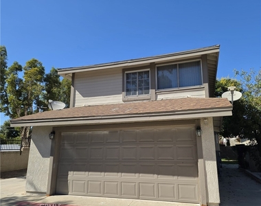 1614 S Campus Avenue - Photo Thumbnail 1