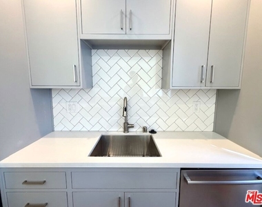 8115 Romaine Street - Photo Thumbnail 6