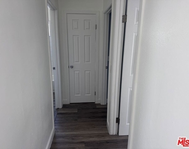 10406 Avalon Boulevard - Photo Thumbnail 10