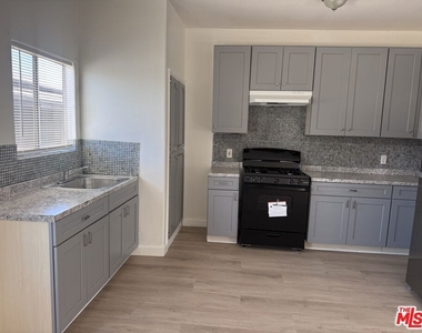 10406 Avalon Boulevard - Photo Thumbnail 3