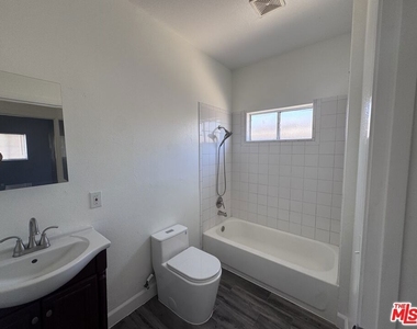 10406 Avalon Boulevard - Photo Thumbnail 7